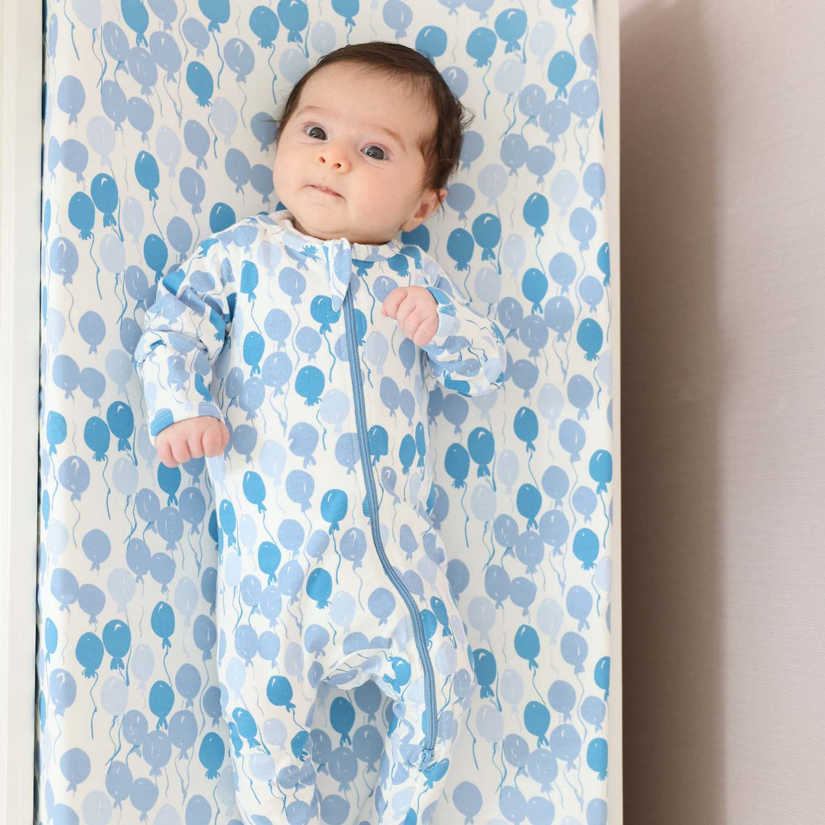 Norani Baby organic footie pajamas, blue balloons print.