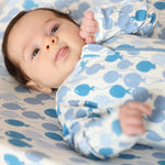 Norani Baby organic footie pajamas with blue balloon print.