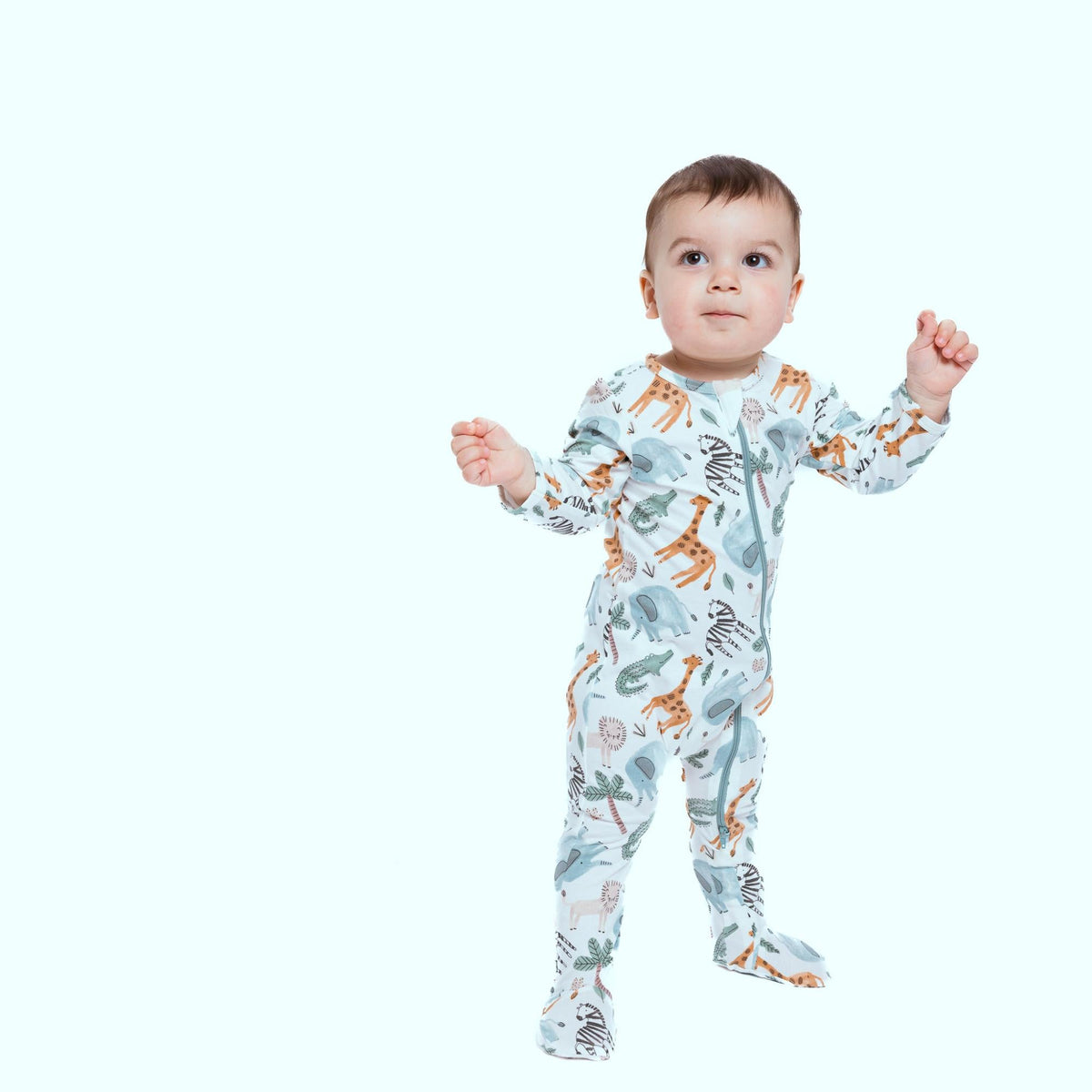 Norani Baby organic footie for newborns with safari animals print and contrast zipper.