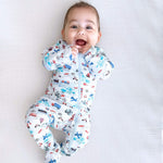 Norani Baby organic footed onesie for newborns with contrast zipper.