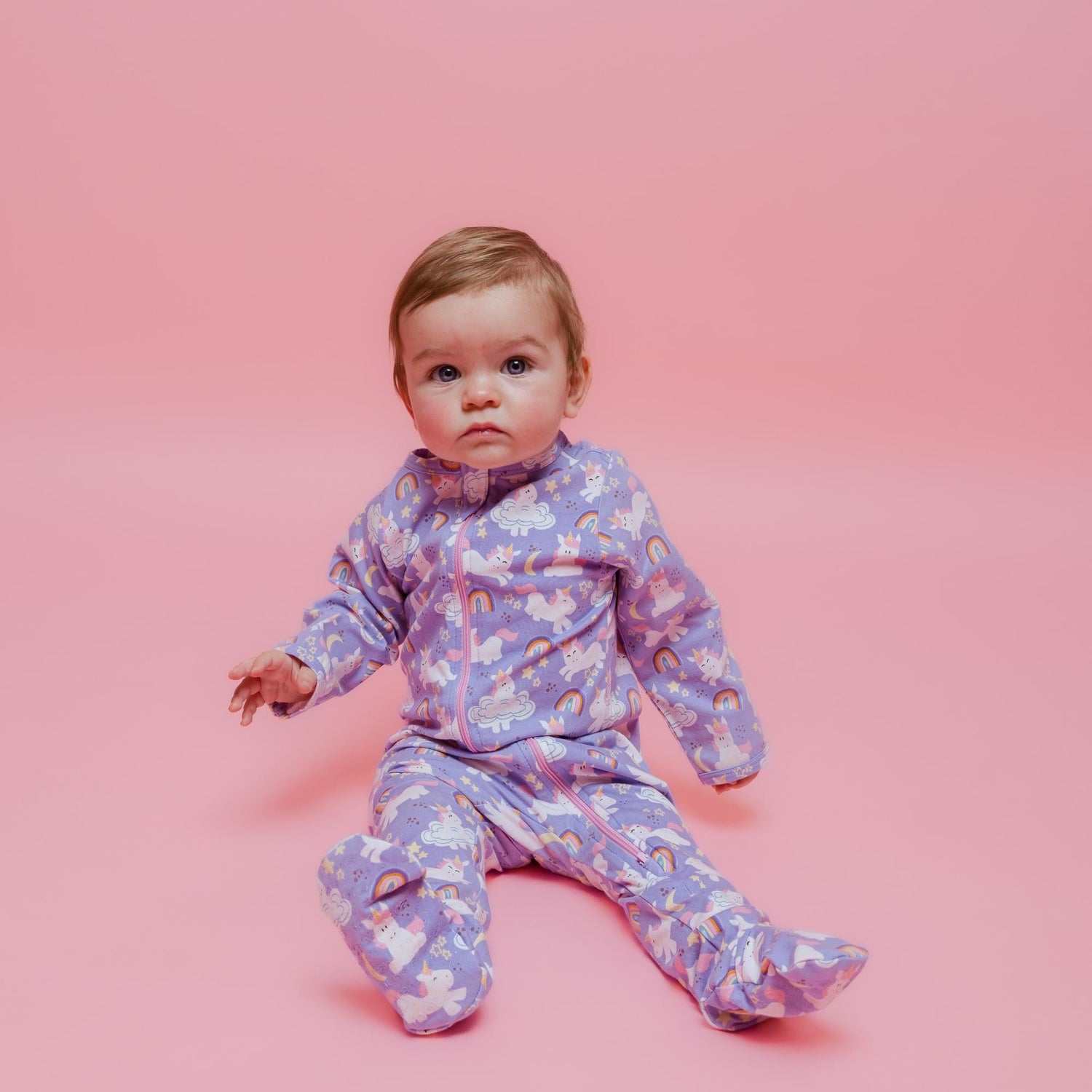 Norani Baby newborn organic footie with contrast zipper.