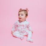Soft Norani Baby organic footie with contrast zipper for newborns.