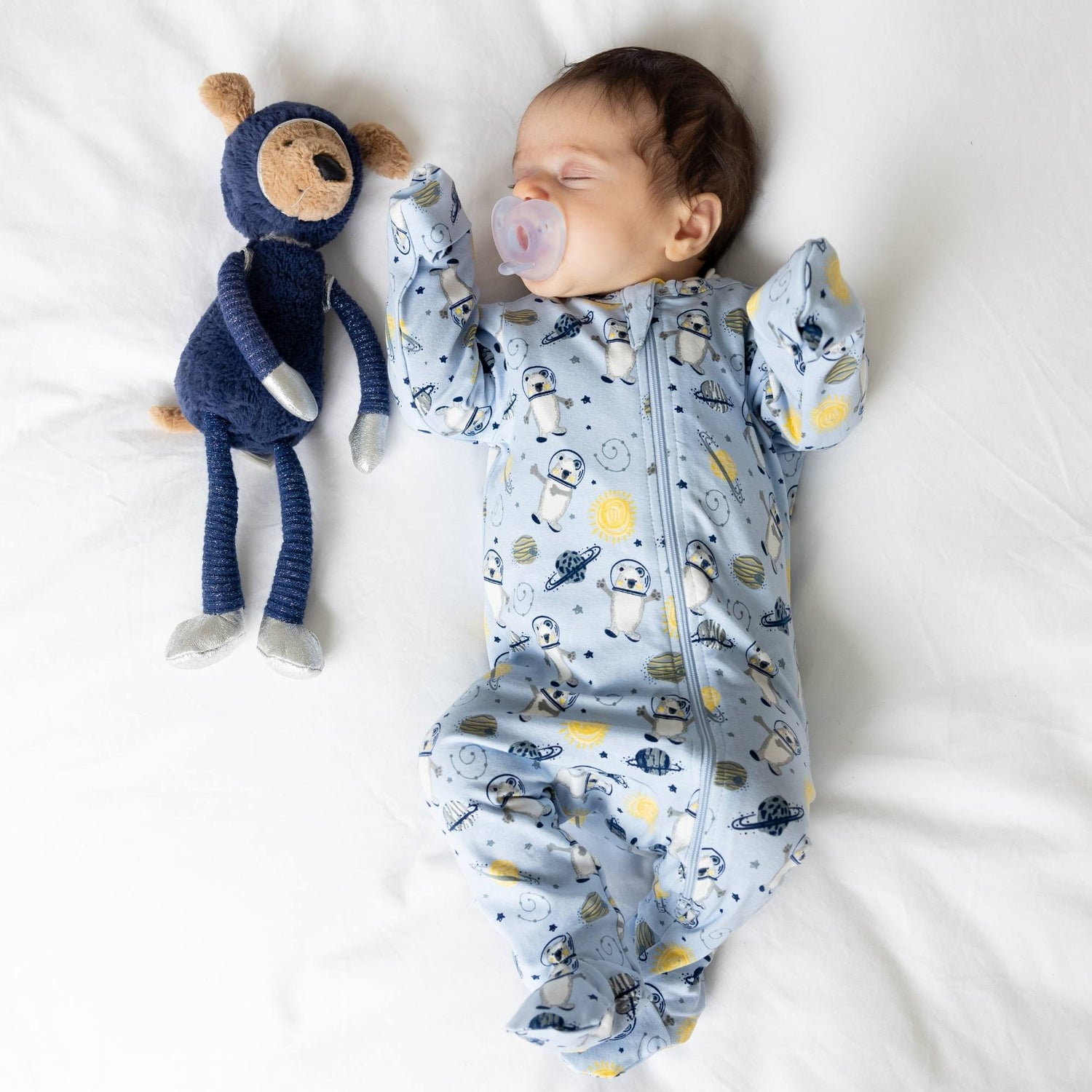 Norani Baby organic footie pajamas with a Space Bears print.