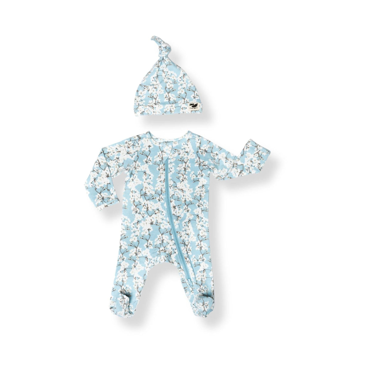Norani Baby organic footed onesie for newborns with contrast zipper.
