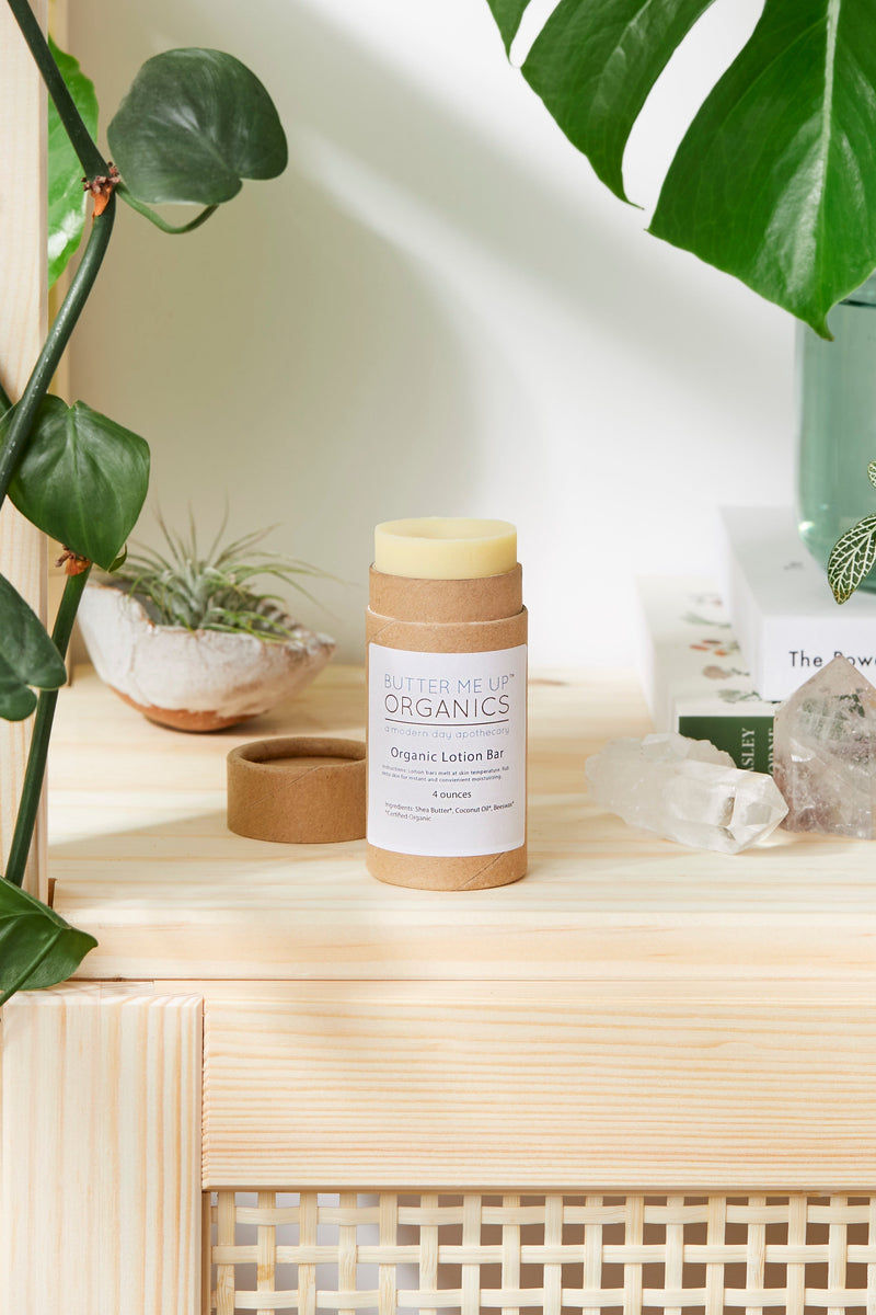 Organic lotion bar made with shea butter and coconut oil, in eco-friendly packaging, providing deep hydration for dry skin.