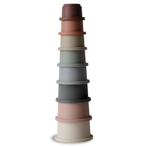 Set of colorful stacking cups toy shaped like a round tower with graduated pieces