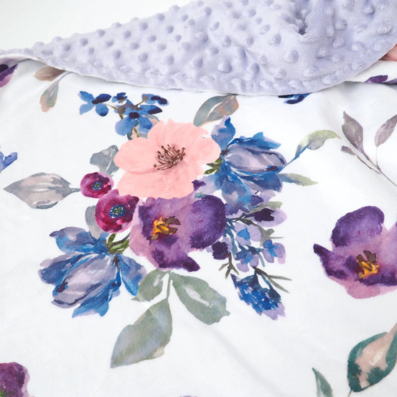 Premium baby and toddler blanket with purple and blush floral design, featuring a soft minky dot texture.