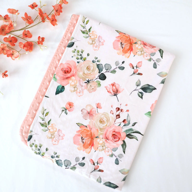 Premium baby and toddler blanket with peach floral pattern, super soft and lightweight for delicate skin.