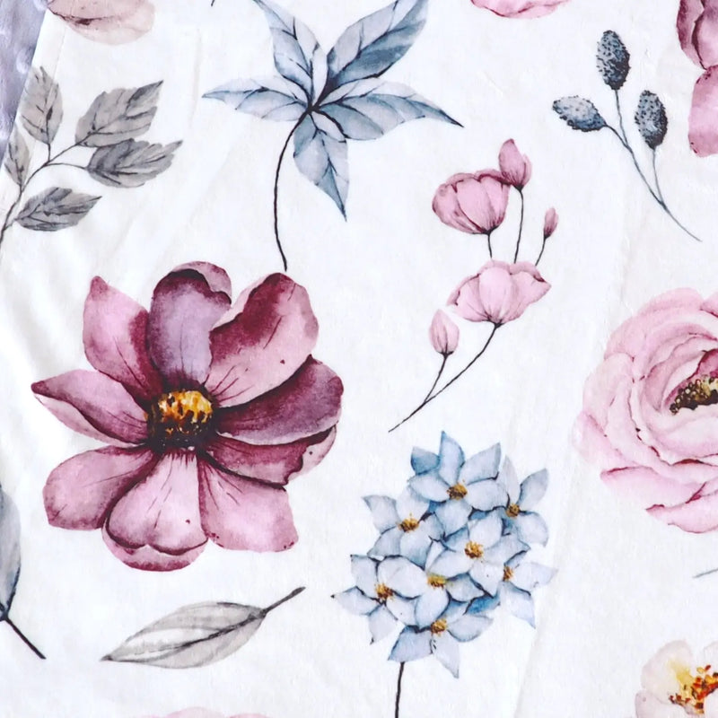 Vintage floral baby and toddler blanket made of soft minky fabric, featuring a unique print design.