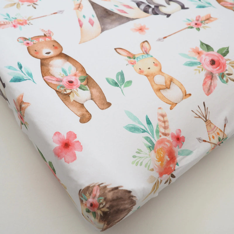 Woodland Tribe themed changing pad cover with soft, stretchy fabric and vibrant animal prints.