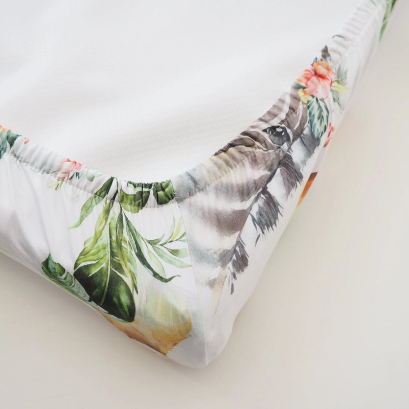Changing pad cover with Africa animals design, soft and stretchy fabric.