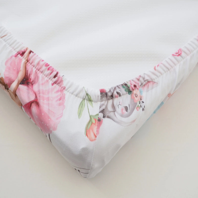 Ballerina-themed changing pad cover with soft, stretchy fabric.