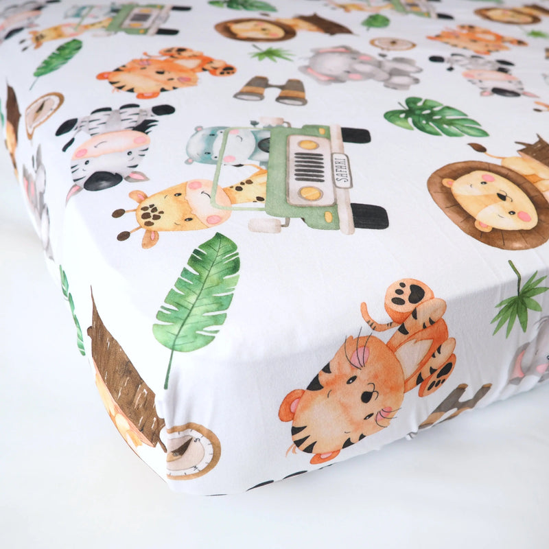 Safari-themed fitted crib sheet with animals and unique patterns, buttery soft fabric.