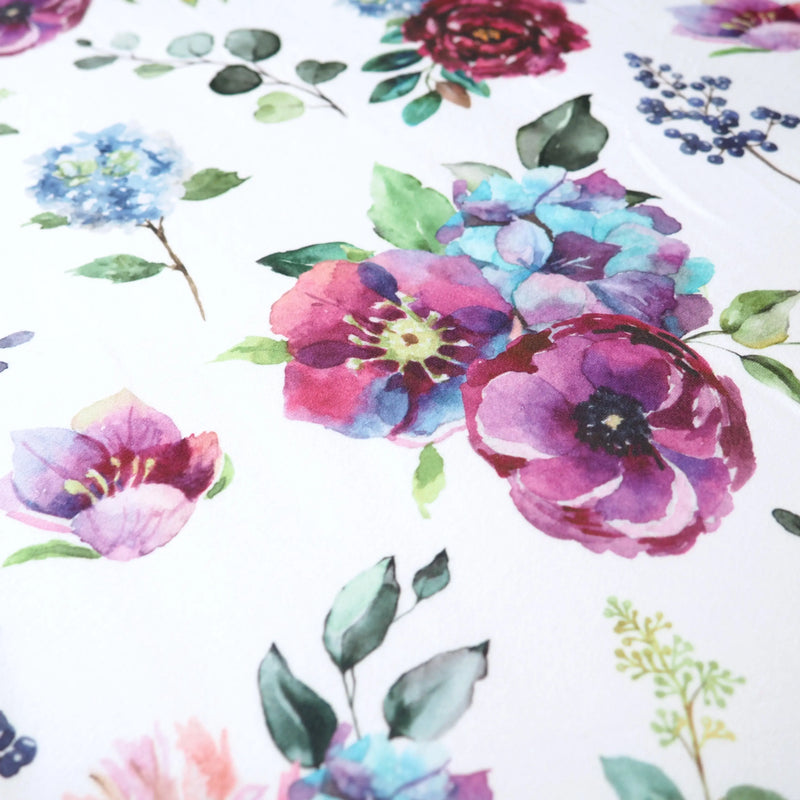 Blue floral fitted crib sheet with unique pattern, perfect for standard crib, 95% rayon, 5% spandex, soft and machine washable.
