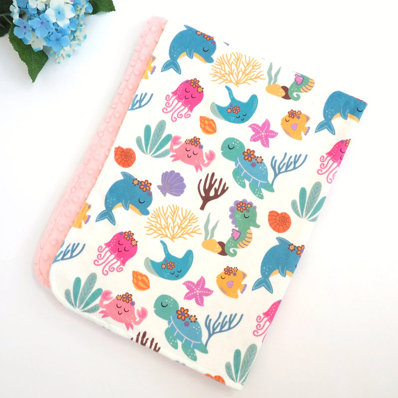 Baby & Toddler Minky Blanket with undersea adventure theme, featuring colorful ocean creatures; premium minky fabric for sensory stimulation.