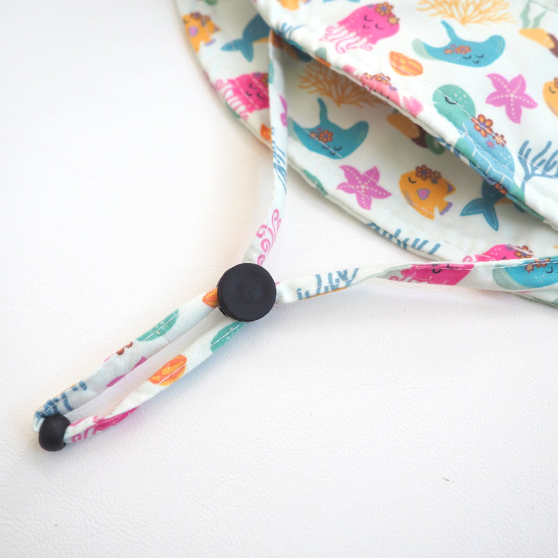 Baby & Kids Sun Hat with Undersea Adventure pattern and adjustable strap.