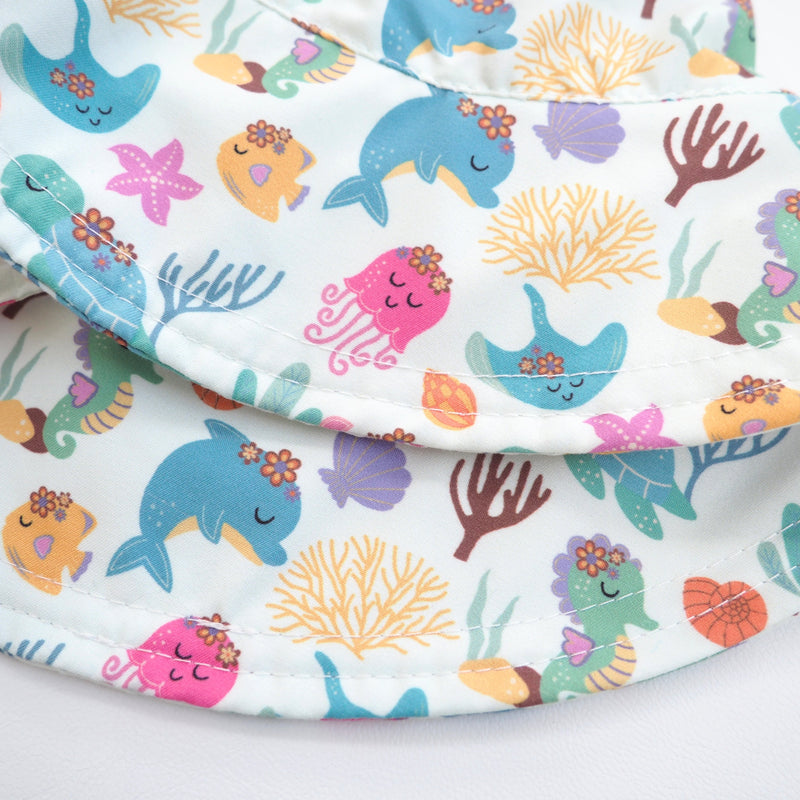 Baby & Kids Sun Hat with Undersea Adventure pattern, featuring dolphins and coral designs.