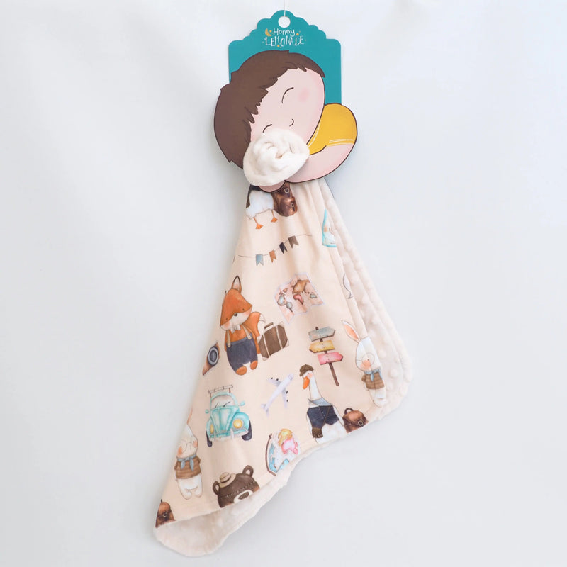 Mini Minky World Explorer toddler blanket, lightweight and soft, with colorful travel-themed design.