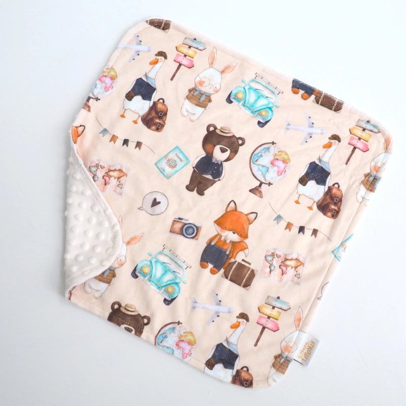 Mini Minky World Explorer toddler blanket with playful animal and travel prints, 18x18 inches.