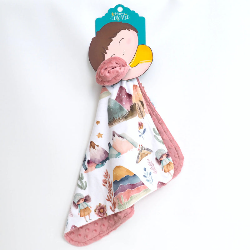 Mini Minky Dreamland toddler blanket with colorful pattern and soft Minky dot texture.