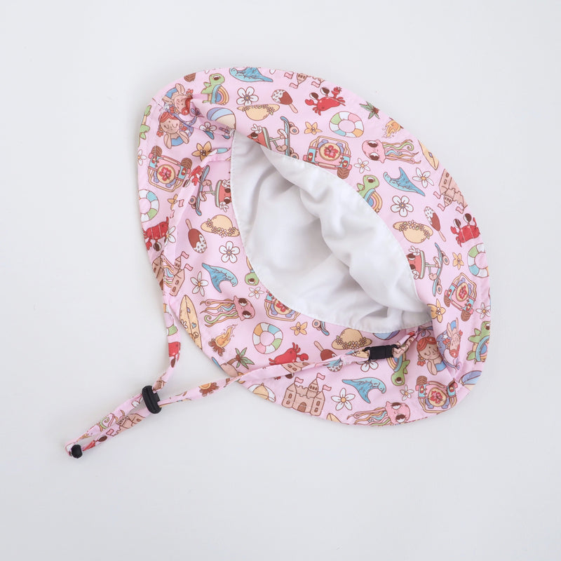 Baby & Kids Sun Hat with colorful summer print and chin strap for UV protection.