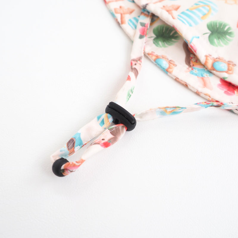 Baby and kids sun hat with tropical Aloha print, featuring lightweight and breathable polyester fabric.