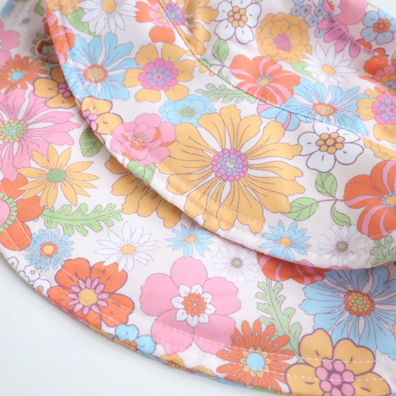 Retro floral baby and kids sun hat offering UV protection.