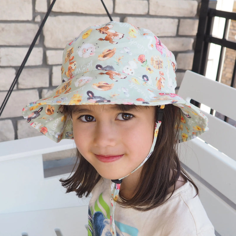 Baby & Kids Sun Hat with farm animal pattern, providing UV protection and comfort.
