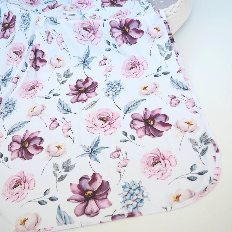 Buttery soft and stretchy swaddle blanket with vintage floral design, 47x47 inches.
