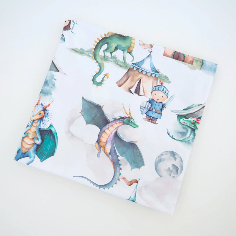 buttery soft and stretchy swaddle blanket with dragons and knights design