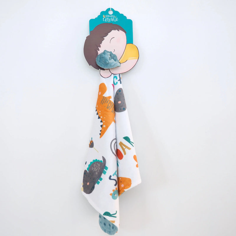 Mini Minky - Dinoland Blue toddler blanket with colorful dinosaur print, lightweight and soft for sensory stimulation.