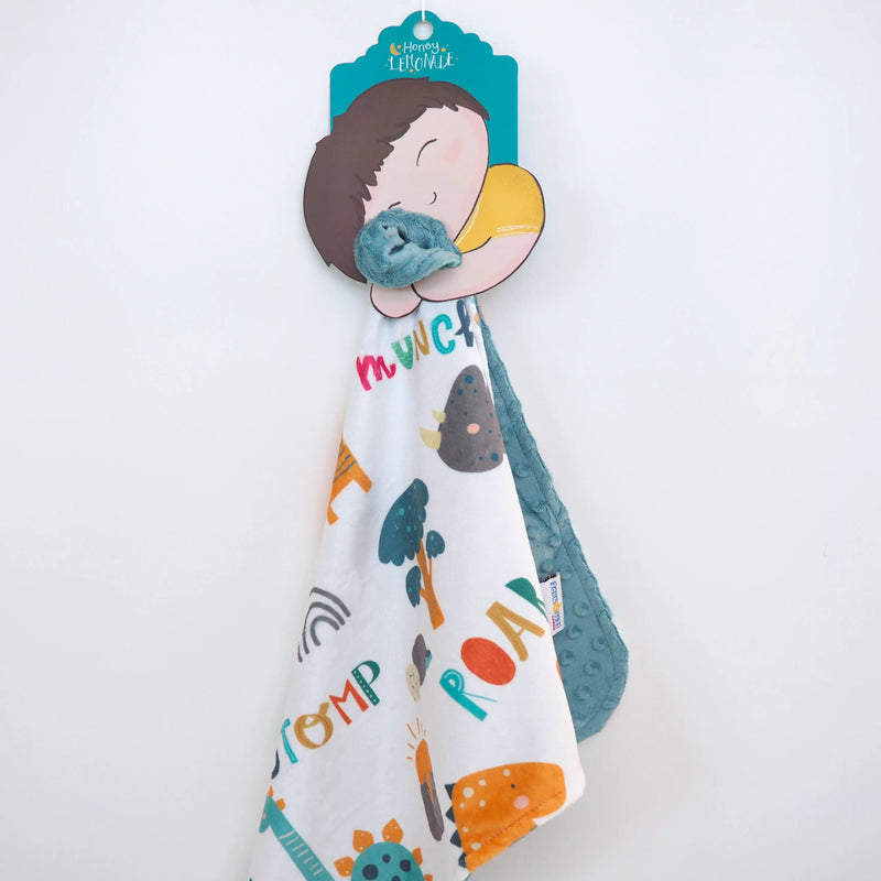 Mini Minky Dinoland Blue toddler blanket with colorful dinosaur print and blue textured back, perfect for sensory play and portability.