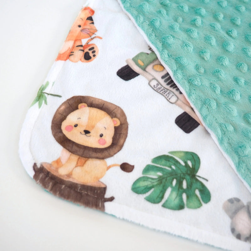 Mini Minky - Safari toddler blanket with animals and green minky dot texture.