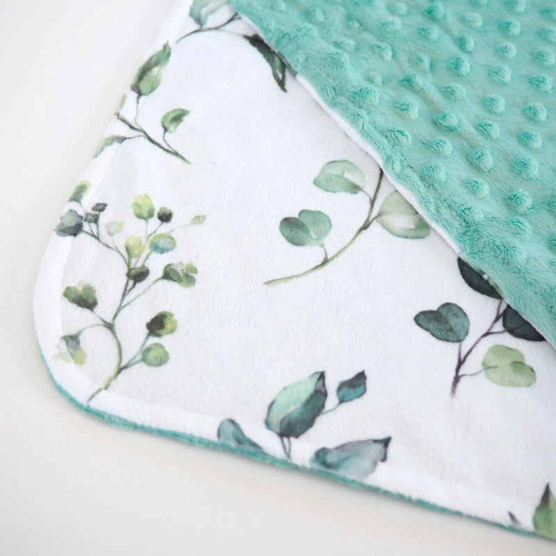 Mini Minky blanket in eucalyptus design with soft Minky dot texture, perfect for toddlers.