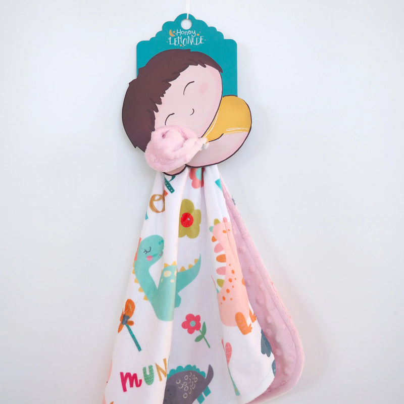 Mini Minky - Dinoland Pink toddler blanket with dinosaur print and soft Minky fabric.