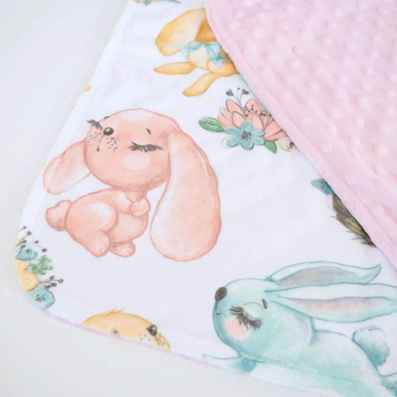 Mini Minky blanket featuring cute bunny design and soft Minky dot texture, perfect for toddlers.