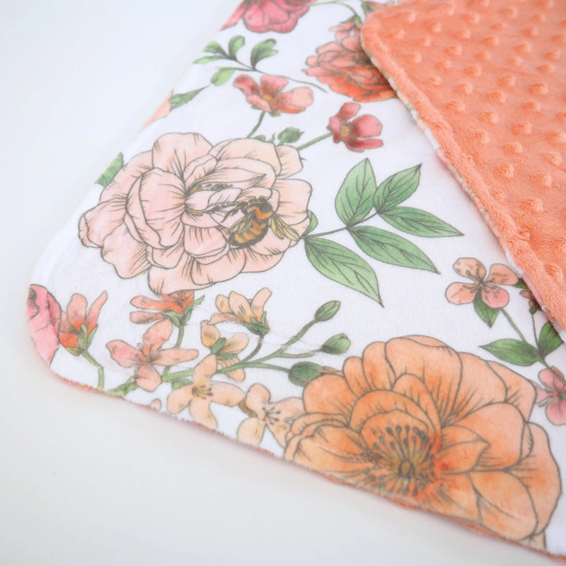 Mini Minky blanket with botanical floral pattern, featuring soft Minky dot texture on the reverse side.