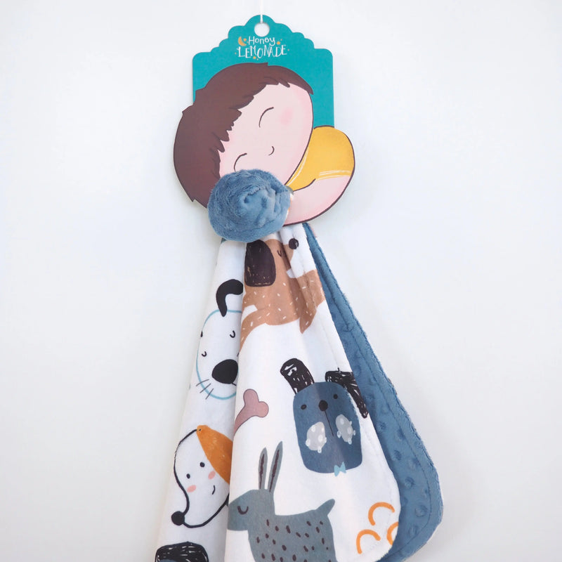 Mini Minky toddler blanket with dog design, lightweight and soft, perfect for travel and sensory stimulation.