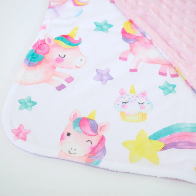 Mini Minky toddler blanket with unicorn design, made from soft Minky fabric, 18x18 inches, lightweight and perfect for travel.
