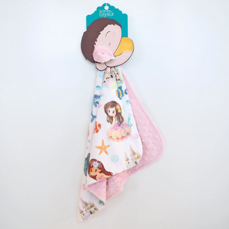 Mini Minky mermaid print toddler blanket with pink minky dot texture.