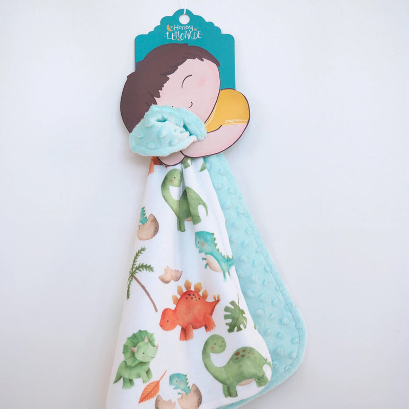 Toddler-sized Mini Minky Dino blanket with colorful dinosaur print, made of soft Minky fabric.