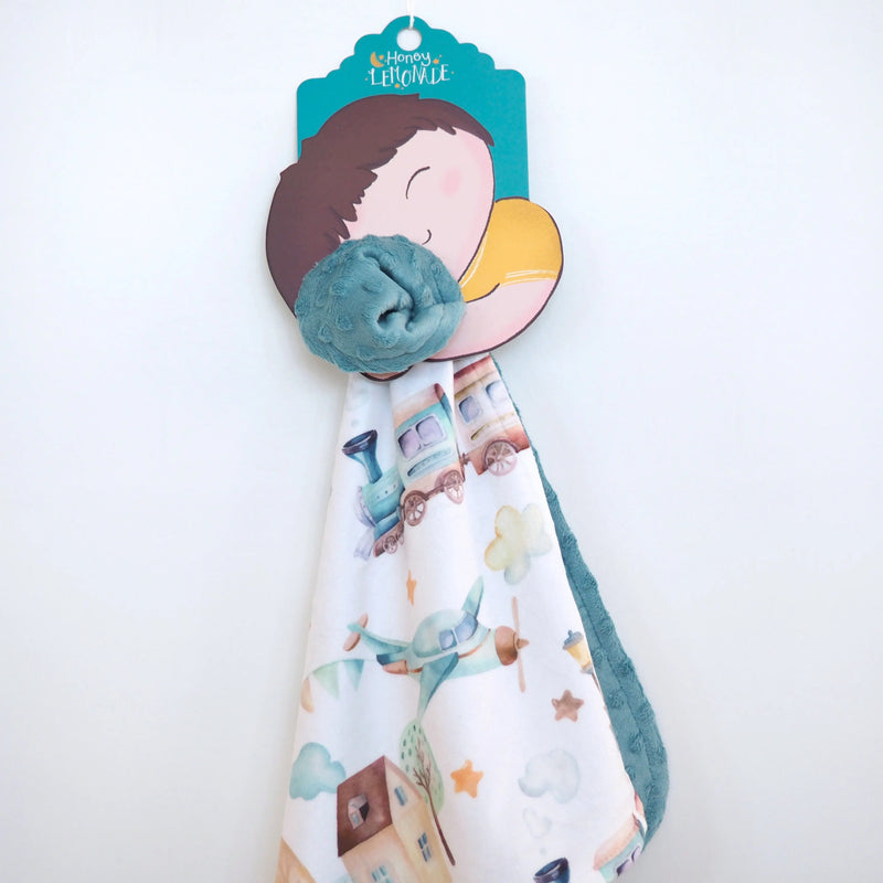 Mini Minky blanket with airplane and train design, perfect for toddlers, made from soft Minky fabric.