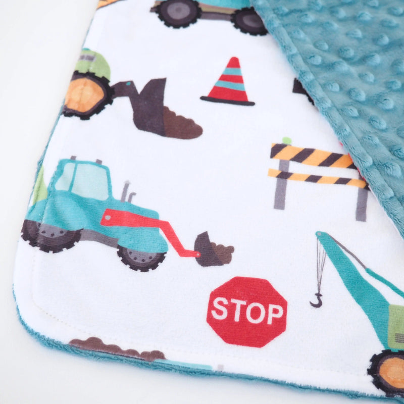 Mini Minky construction trucks blanket with soft, premium Minky fabric and fun design for toddlers.