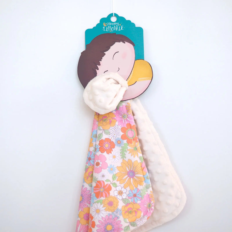 Mini Minky retro floral toddler blanket with colorful floral pattern and soft minky dot texture.