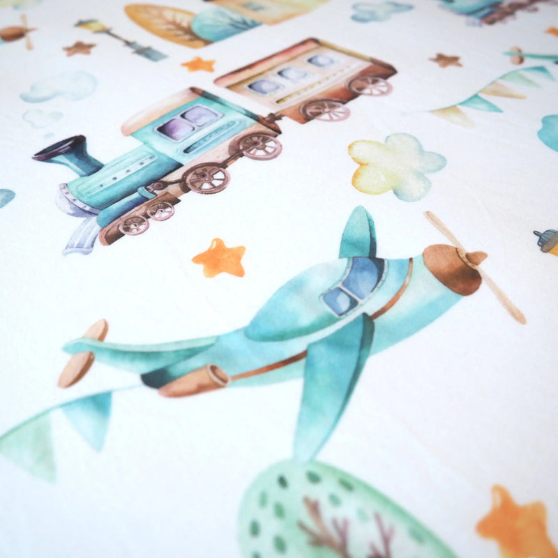 Airplane and train patterned fitted crib sheet, soft rayon-spandex fabric.