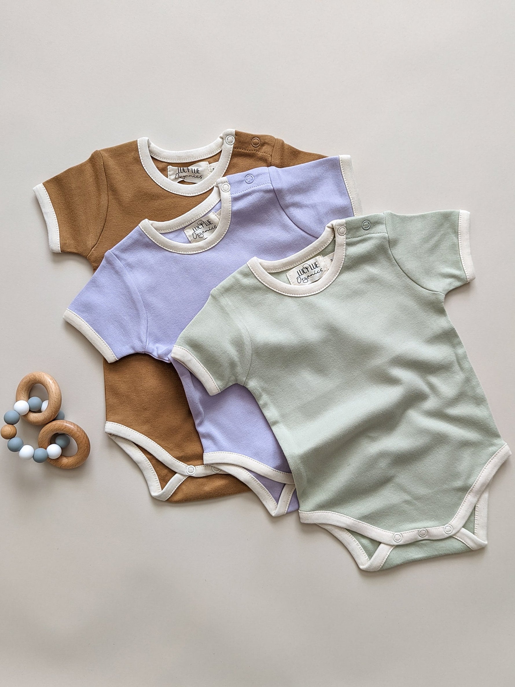 Organic organic baby bodysuit by LUCY LUE ORGANICS at Everetts Place