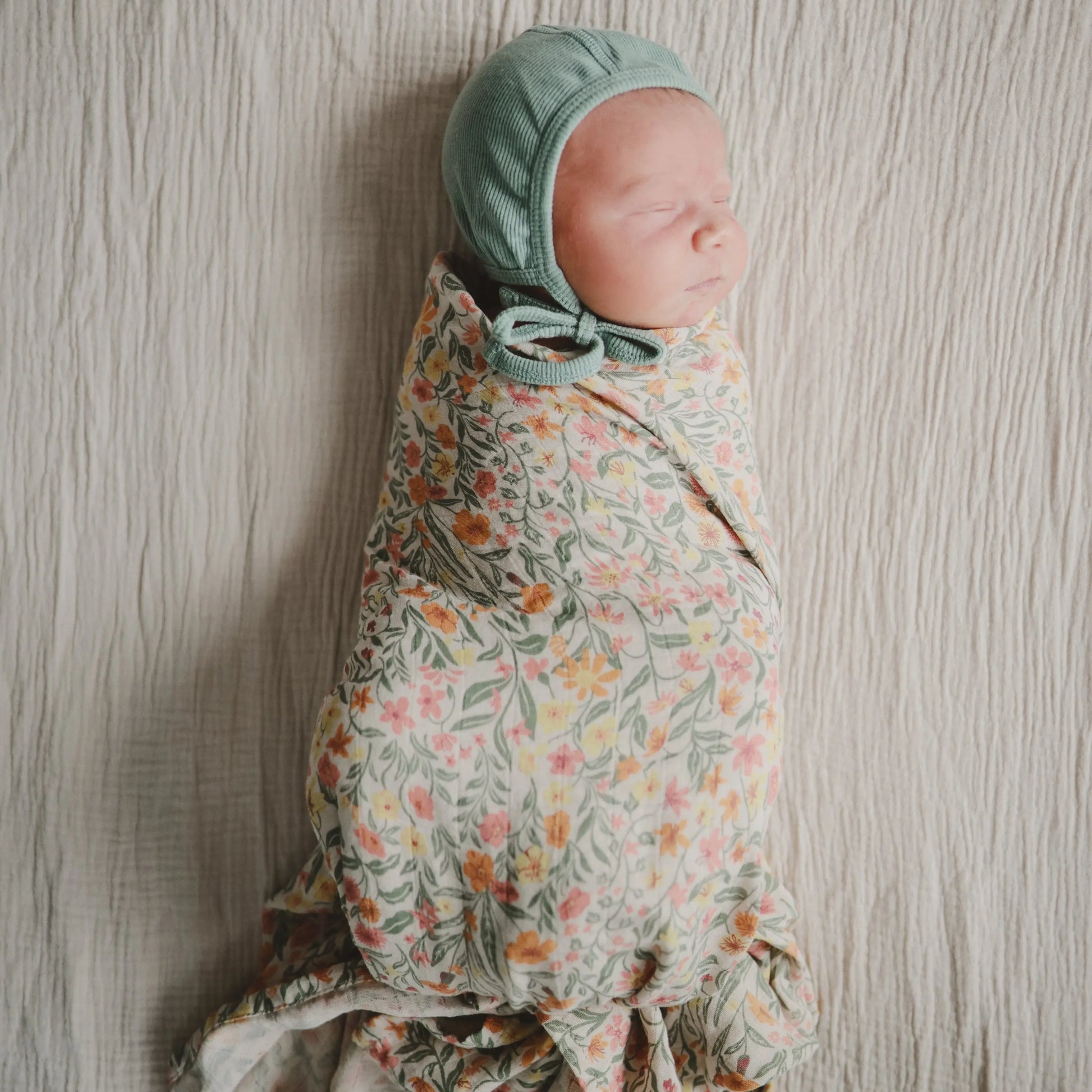 Organic Cotton Muslin Swaddle Blanket for Baby Cuddling and Nursing Mushie