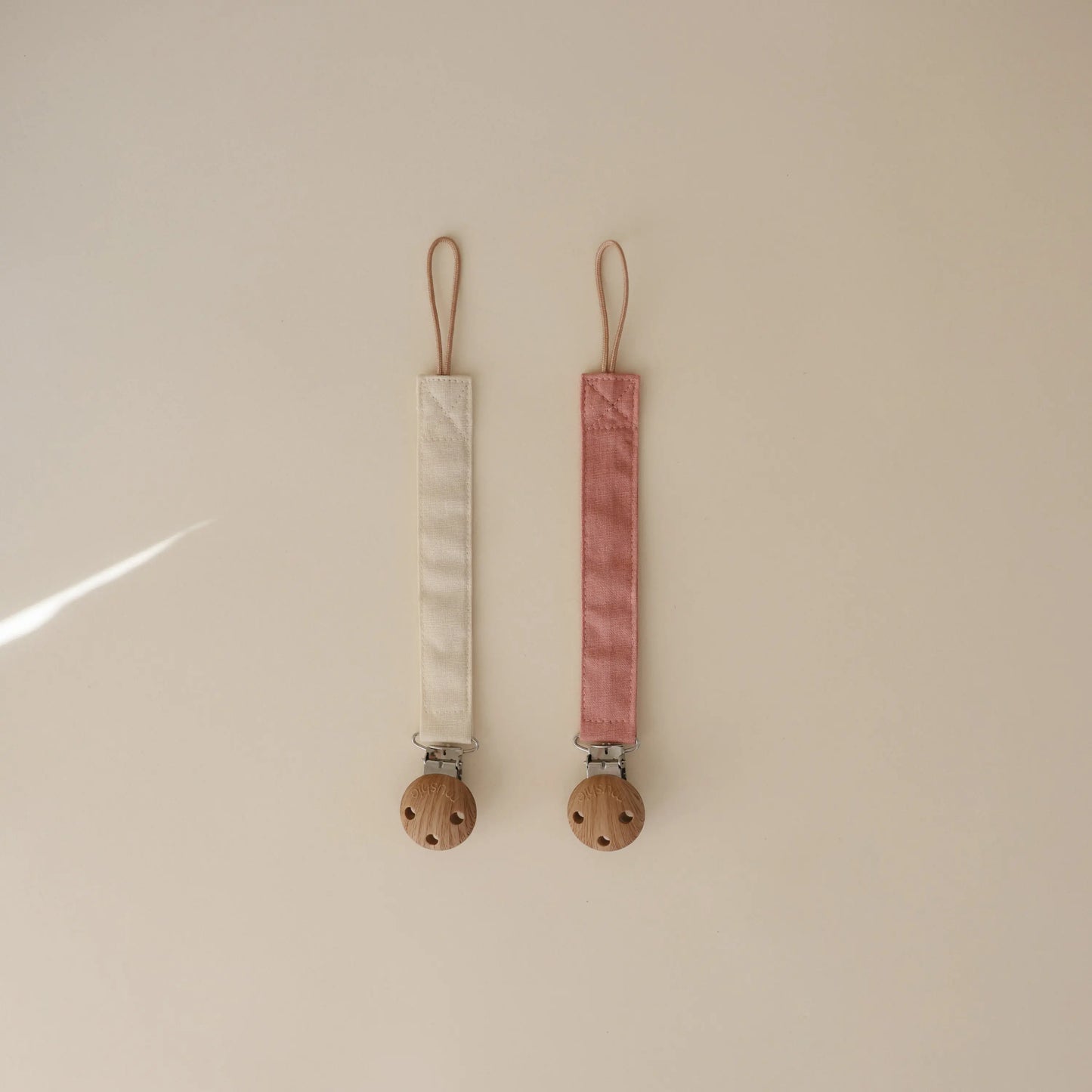Linen Pacifier Clip Two Pack with Water Resistant Coating and Faux Wood Silicone Clasp Mushie