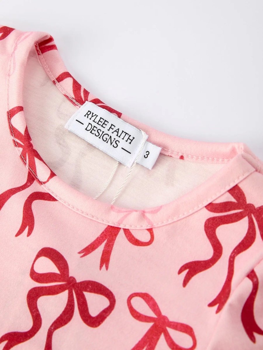Pink Bow Print Girls Dress With Ruffle Hem By Rylee Faith Rylee Faith Designs Everetts Place Boutique
