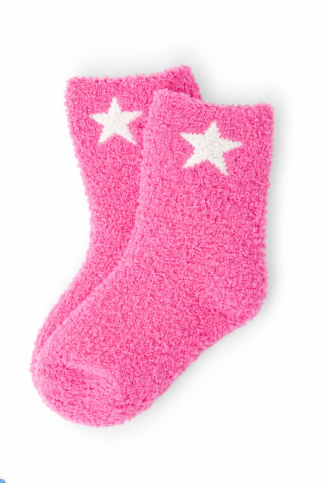 Bright pink cozy socks with a coconut-white star pattern for little feet